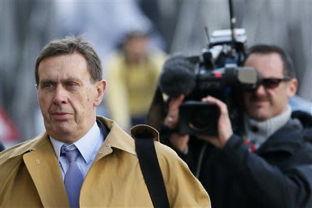 Clive Goodman, the former royal editor at the News of the World arrives at the Old Bailey courthouse in London October 29, 2013. REUTERS/Stefan Wermuth