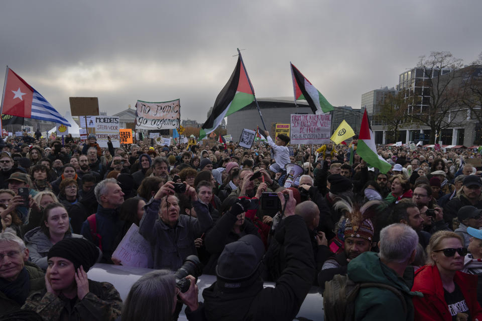 A small group of Palestinians demonstrate as tens of thousands of people gathered in Amsterdam, Netherlands, Sunday, Nov. 12, 2023, to call for more action to tackle climate change. Thunberg was among the speakers at the march that comes 10 days before national elections in the Netherlands. (AP Photo/Peter Dejong)