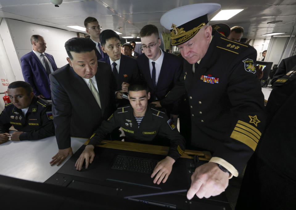 In this photo released by Russian Defense Ministry Press Service on Saturday, Sept. 16, 2023, North Korea's leader Kim Jong Un, foreground left, listens to explanations by Admiral Nikolai Yevmenov, Commander-in-Chief of the Russian Navy, right, while visiting the Admiral Shaposhnikov frigate of the Russian navy in the port of Vladivostok, Russian Far East. The visit was part of Kim's trip across Russia's Far East that has featured talks with Russian President Vlaidmir Putin and sparked Western concerns about an arms deal between the two old allies. (Russian Defense Ministry Press Service via AP)