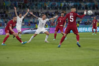 Italy's Ciro Immobile, center, calls for referee attention during the Euro 2020, soccer championship group A match between Italy and Turkey, at the Rome Olympic stadium, Friday, June 11, 2021. (AP Photo/Alessandra Tarantino, Pool)