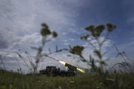 Ukrainian MSLR "Verba" shoots toward Russian positions at the frontline in Kharkiv region, Ukraine, on Tuesday, Aug. 2, 2022.(AP Photo/Evgeniy Maloletka)