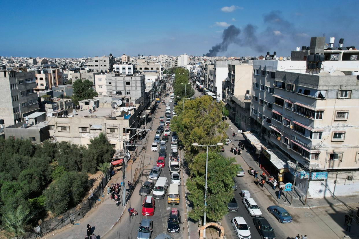 Palestinians flee from northern Gaza to the south after the Israeli army issued an unprecedented evacuation warning (Copyright 2023 The Associated Press. All rights reserved.)