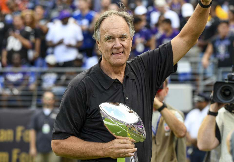 BALTIMORE, MD - SEPTEMBER 29: Former Baltimore Ravens head coach Brian Billick is introduced to the crowd and shows the Super Bowl trophy won in 2000 prior to the game against the Cleveland Browns on September 29, 2019, at M&T Bank Stadium in Baltimore, MD.  (Photo by Mark Goldman/Icon Sportswire via Getty Images)