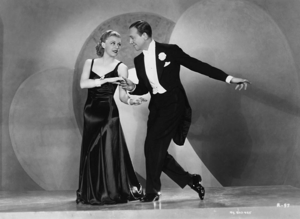 American dancers, singers and actors Ginger Rogers (1911 -1995) and Fred Astaire (1899 - 1987) dancing in a scene from 'Roberta' , directed by William A. Seiter, 1935. (Photo by RKO/Archive Photos/Getty Images)
