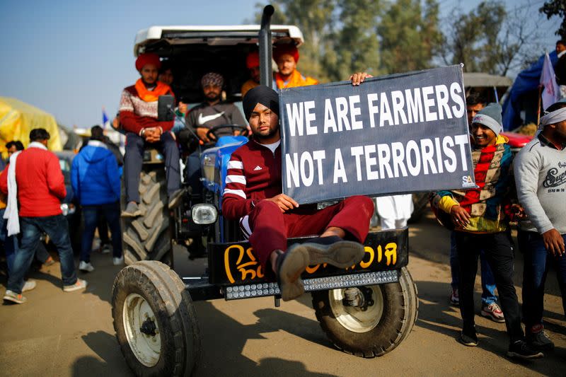 Farmers protest against the newly passed farm bills at Singhu border near New Delhi