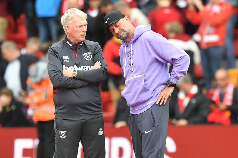 LIVERPOOL, ENGLAND - SEPTEMBER 24:  Liverpool's Manager Jurgen Klopp and West Ham United's Manager David Moyes before the Premier League match between Liverpool FC and West Ham United at Anfield on September 24, 2023 in Liverpool, England. (Photo by Dave Howarth - CameraSport via Getty Images)