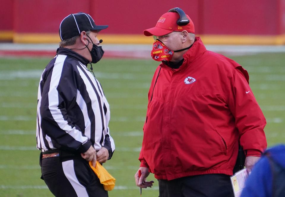 Kansas City Chiefs head coach Andy Reid talks to an official in the fourth quarter against the Atlanta Falcons at Arrowhead Stadium.