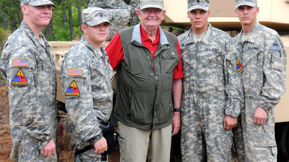 Pfc. Wesley Adams, Spc. Michael Adams, Spc. Grant Vonmoss, and Sgt. 1st Class Marc Westenbarger, an armor tank crew from C Company, 1st Battalion, 77th Armor Regiment, 4th Brigade Combat Team, 1st Armored Division, pose for a photograph with retired Gen. Gordon R. Sullivan, the 32nd Chief of Staff, during the inaugural Sullivan Cup precision tank gunnery competition May 10, 2012 held at Fort Benning, Ga. (Sgt. Brandon Bednarek/Army)