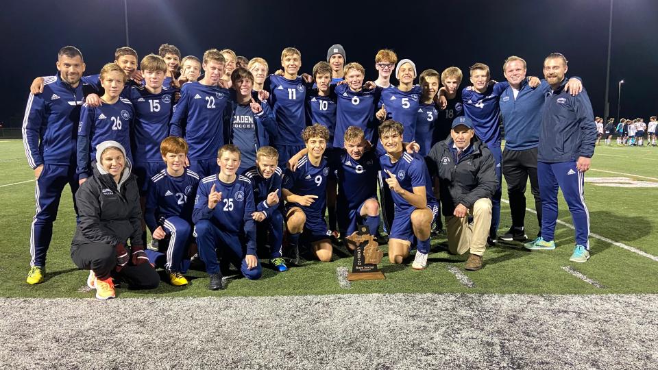 Pictured: The Colts boys soccer team and head coach Neal Brady; Assistant Coaches Emily Calvert, Jon Church, Nolan Sullivan, and Aaron Tracy.