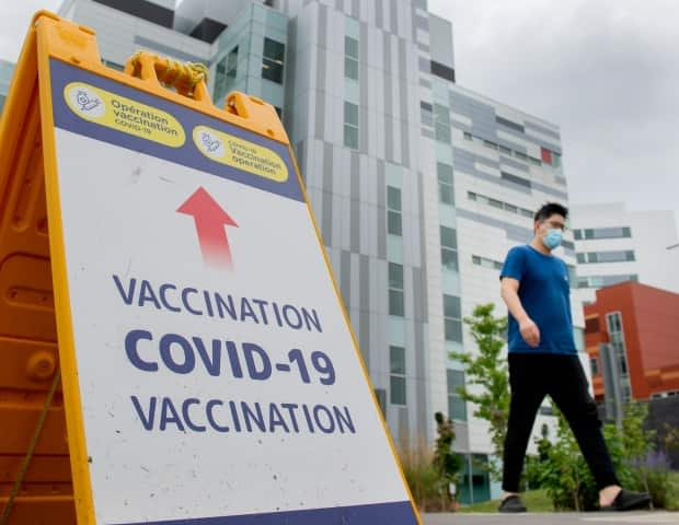 Premier François Legault said Thursday that a vaccine passport system will allow Quebec to avoid the widespread closures that have marked its pandemic response to date. (Graham Hughes/The Canadian Press - image credit)