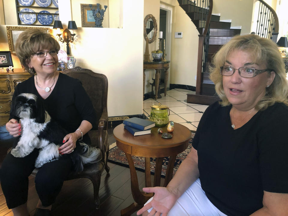 Terrie Dietrich, left, and her daughter Erin Cross, talk in Dietrich’s home in Henderson, Nev., Thursday, Aug. 22, 2019. “Medicare for All” remains hugely popular, but majorities say they’d prefer building on “Obamacare” to expand coverage instead of a new government program that replaces America’s mix of private and public insurance. Democrat Dietrich, 74, has Medicare and supplements that with private insurance, an arrangement she said she’s pretty comfortable with. Cross, 54, also a Democrat, said she’s not comfortable with switching to a system where a government plan is the only choice. (AP Photo/Michelle L. Price)