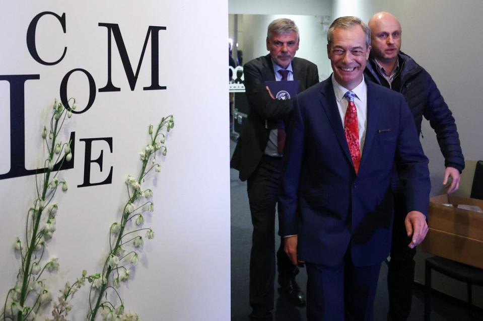 Farage entering the venue before it was shut down (Reuters)