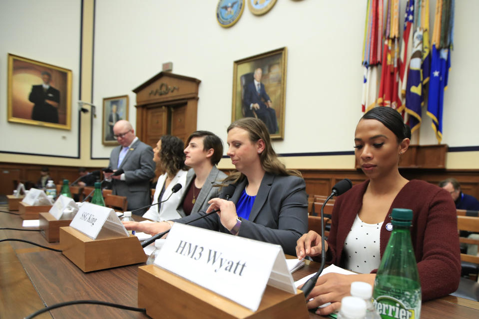 From left, transgender military members Navy Lt. Cmdr. Blake Dremann, Army Capt. Alivia Stehlik, Army Capt. Jennifer Peace, Army Staff Sgt. Patricia King and Navy Petty Officer Third Class Akira Wyatt, prepare for the House Armed Services Subcommittee on Military Personnel hearing on Capitol Hill in Washington, Wednesday, Feb. 27, 2019, as the Trump administration pushes to ban transgender troops. This is the first ever hearing that transgender military members openly testified in Congress. (AP Photo/Manuel Balce Ceneta)