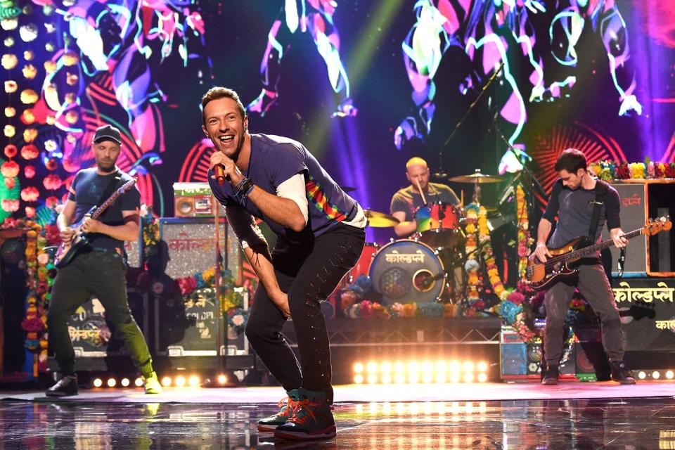 Recording artists Jonny Buckland, Chris Martin, Will Champion and Guy Berryman of music group Coldplay perform onstage during the 2015 American Music Awards at Microsoft Theater on November 22, 2015 in Los Angeles, California.