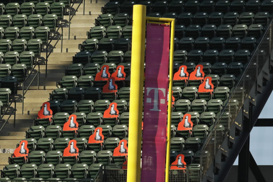 Cardboard cutouts of seagulls line the upper-deck seats behind the left field foul pole during a baseball game between the Oakland Athletics and the San Francisco Giants on Saturday, Aug. 15, 2020, in San Francisco. (AP Photo/Ben Margot)