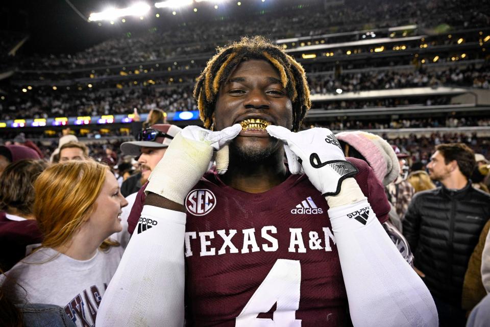 Nov 26, 2022; College Station, Texas, USA; Texas A&M Aggies defensive lineman Shemar Stewart (4) shows off his gold grill smile after the Aggies defeat the LSU Tigers at Kyle Field.
