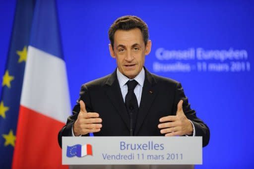 French President Nicolas Sarkozy speaks during a press conference after an extraordinary EU summit focused on Libya. European Union leaders on Friday agreed to "examine all necessary options" to protect civilians in Libya as they ramped up pressure on Moamer Kadhafi at a crisis summit