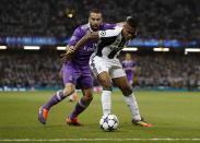 <p>Real Madrid’s Daniel Carvajal in action with Juventus’ Alex Sandro </p>