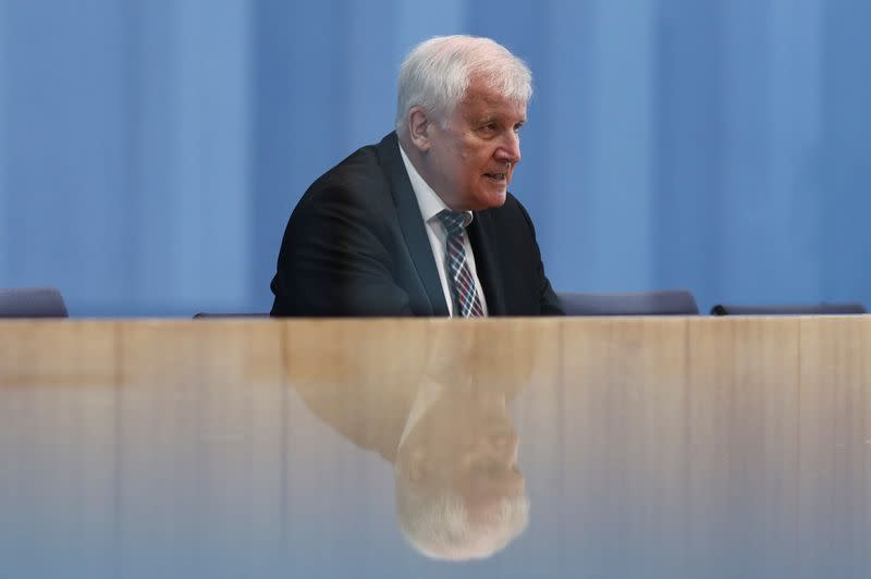 Germany's Interior Minister Seehofer attends news conference on migration, in Berlin