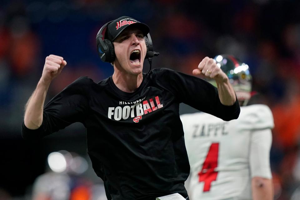 Western Kentucky offensive coordinator Zach Kittley celebrates as his team scores a touchdown during the Conference USA championship game Friday in San Antonio. UT-San Antonio beat Western Kentucky 49-41. Late Sunday, Kittley agreed to be the offensive coordinator at Texas Tech under new coach Joey McGuire.