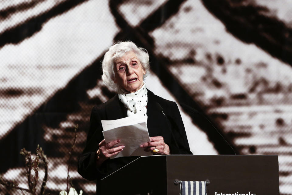 FILE - Auschwitz survivor Eva Pusztai-Fahidi delivers her speech during an event of the International Auschwitz Committee to commemorate the 70th anniversary of the liberation of the Auschwitz Nazi death camp in Berlin, Monday, Jan. 26, 2015. Holocaust survivor Eva Fahidi-Pusztai, who spent the late years of her life warning of the re-emergence of far-right populism and discrimination against minorities across Europe, has died. She was 97. (AP Photo/Markus Schreiber, File)