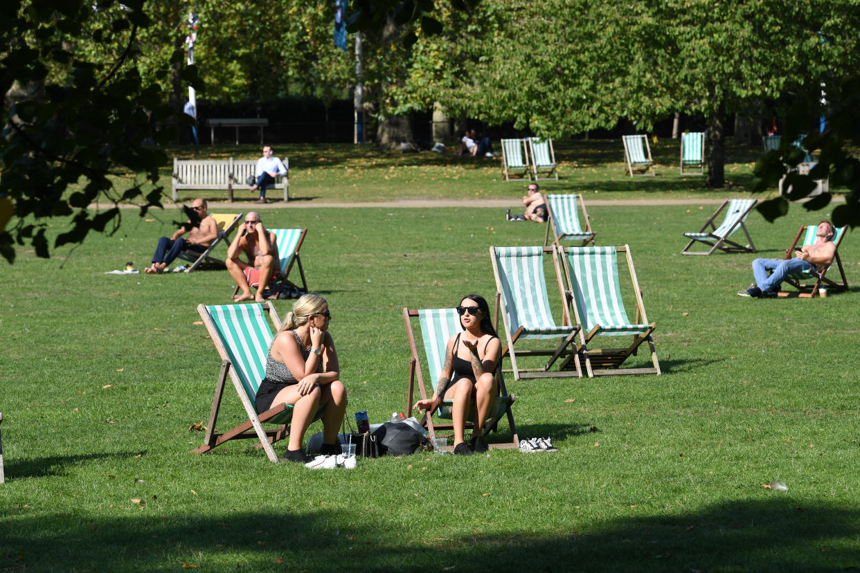 People enjoying the autumn sunshine in St James's Park, London. (Photo by Stefan Rousseau/PA Images via Getty Images)