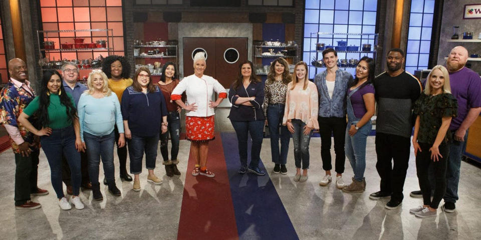 Ariel Robinson (fifth from left, in yellow top), the winner of Season 20 of Food Network's 