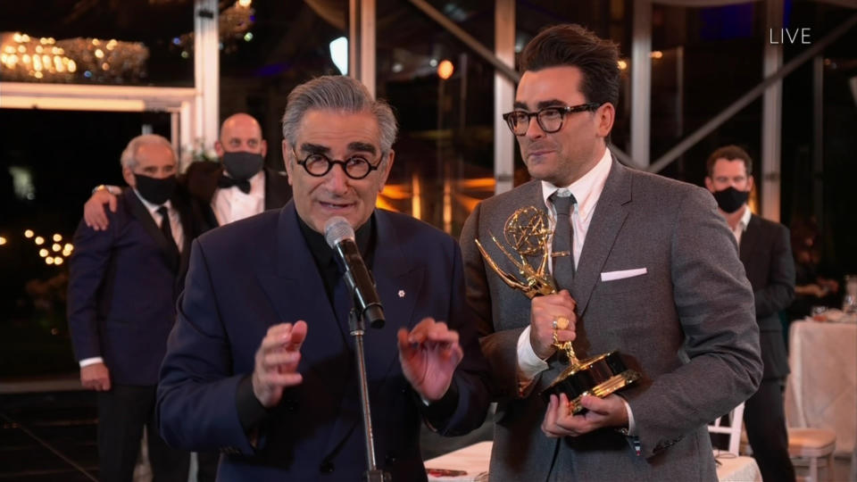 <p>Accepting for Outstanding Comedy Series, an elated <a href="https://ew.com/tag/dan-levy/" rel="nofollow noopener" target="_blank" data-ylk="slk:Dan Levy;elm:context_link;itc:0;sec:content-canvas" class="link ">Dan Levy</a> echoed Murphy by saying, “Our show at its core is about the transformational effects of love and acceptance and that is something we need more of now than ever before,” before becoming too excited and telling Eugene, “Dad, do the rest of the fun stuff!” </p> <p><a href="https://ew.com/tag/eugene-levy/" rel="nofollow noopener" target="_blank" data-ylk="slk:Eugene Levy;elm:context_link;itc:0;sec:content-canvas" class="link ">Eugene Levy</a> then took the mic and turned to his son, thanking him for having taken “our fish-out-of-water story about the Rose family, and transformed it into a celebration of inclusivity, a castigation of homophobia, and a declaration about the power of love. Thank you, Daniel.”</p>