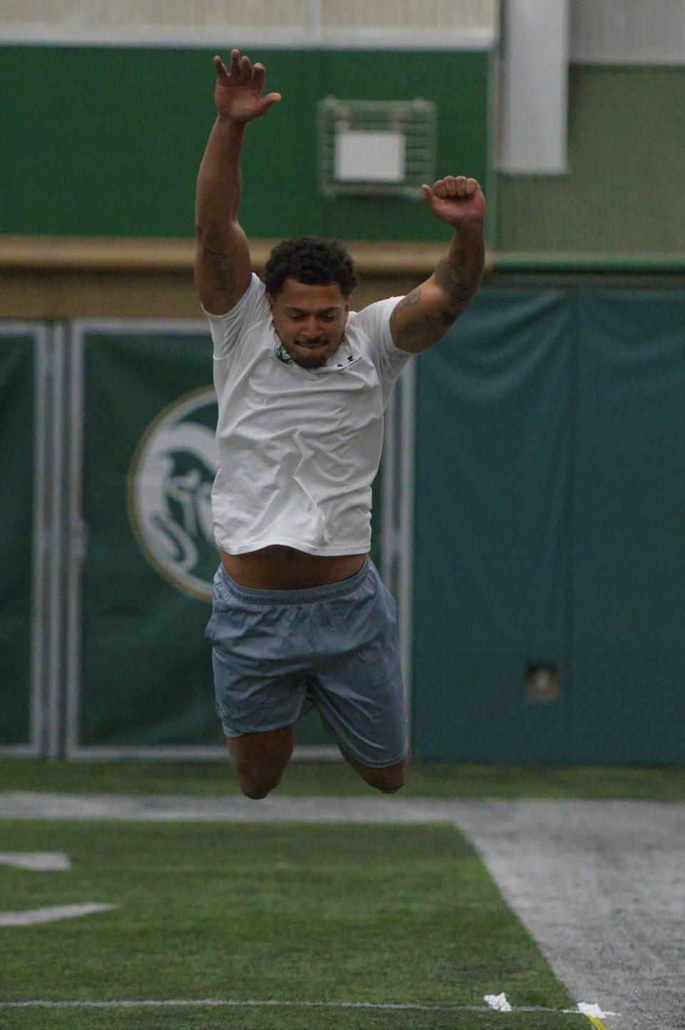 Former Colorado State football player Jamal Hicks works out during pro day at CSU on Friday.