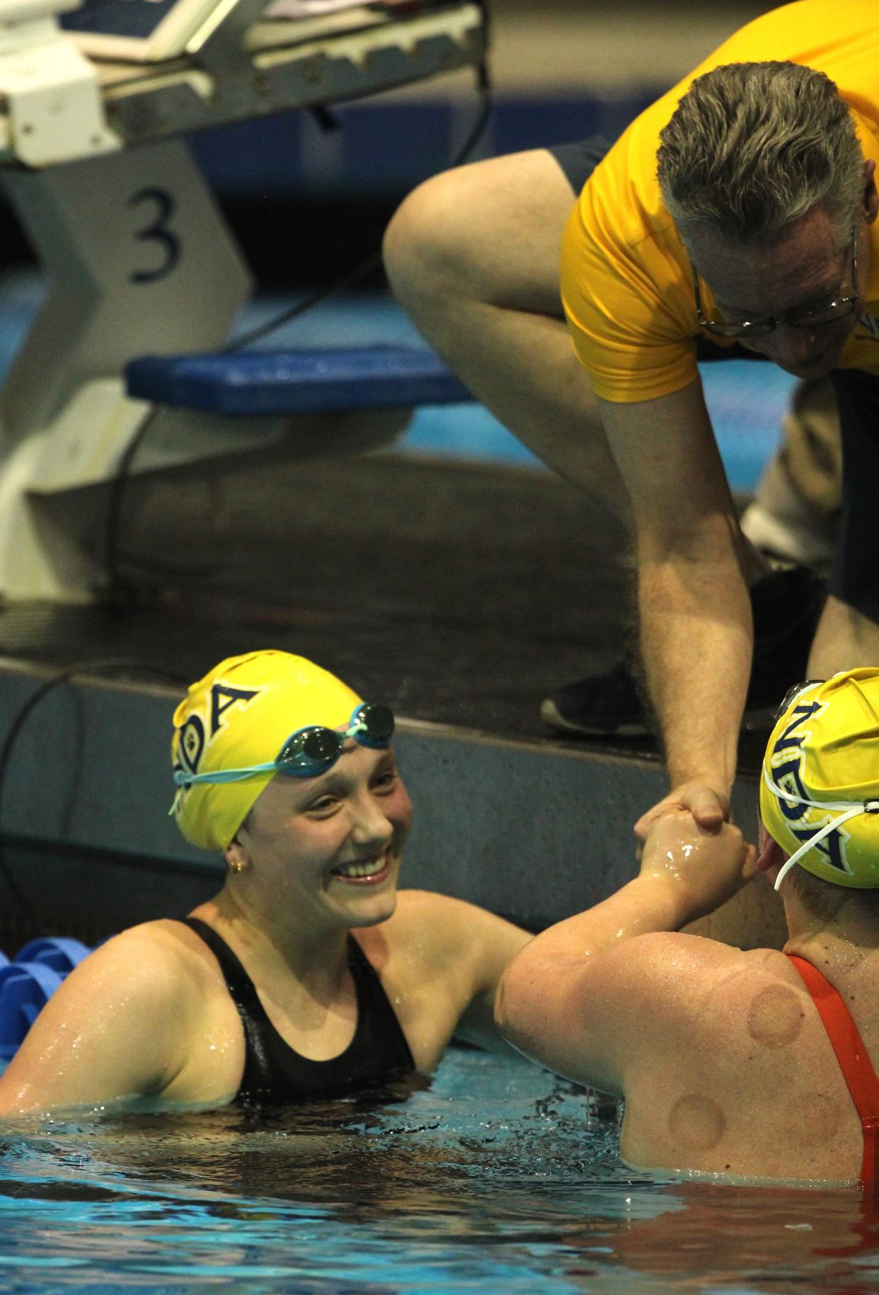 Notre Dame junior Sadie Hartig (left) is The Enquirer's Northern Kentucky and Indiana girls swimmer of the year.