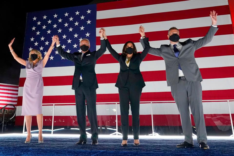 Democratic presidential candidate former Vice President Joe Biden, and his wife Jill Biden, join Democratic vice presidential candidate Sen. Kamala Harris, D-Calif., and her husband Doug Emhoff, during the fourth day of the Democratic National Convention, Thursday, Aug. 20, 2020, at the Chase Center in Wilmington, Del.