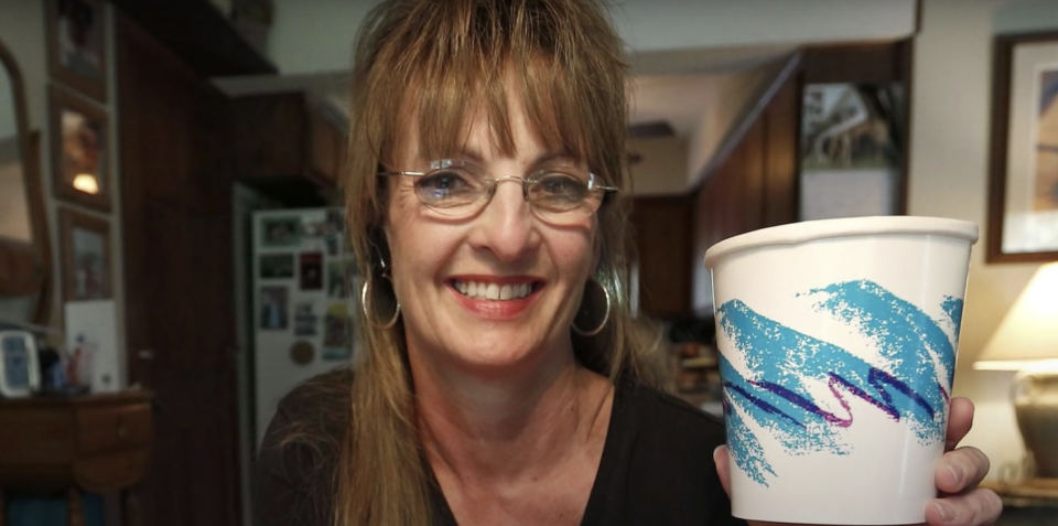 Gina holding a jazz cup