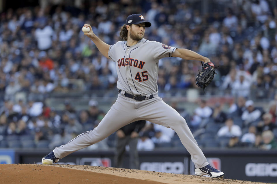 Houston Astros starting pitcher Gerrit Cole (45) delivers against the New York Yankees during the first inning of Game 3 of baseball's American League Championship Series, Tuesday, Oct. 15, 2019, in New York. (AP Photo/Frank Franklin II)