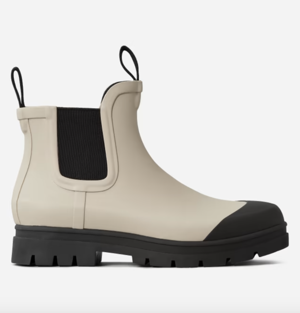 everlane waterproof rain boots in black and beige colourblocking, The Rain Boot in Stone (Photo via Everlane)