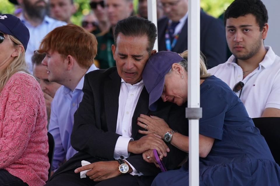 Grace’s parents at a vigil at the University of Nottingham lsat June (PA)