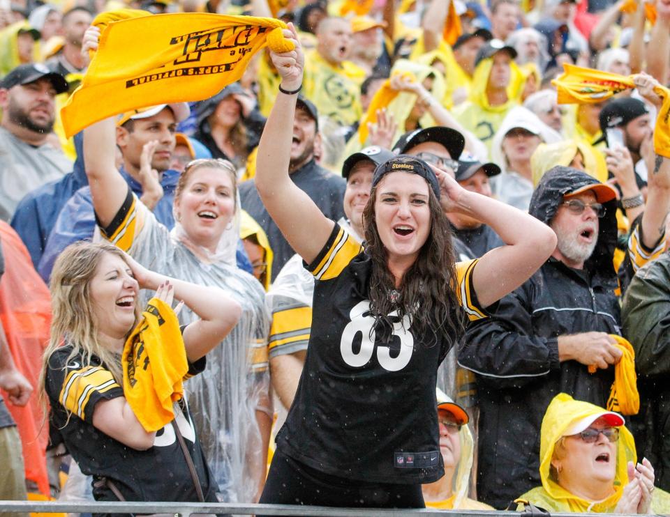 <p>A Pittsburgh Steelers fans waves a Terrible Towel during a timeout in the fourth quarter during the game between the Pittsburgh Steelers and the Cincinnati Bengals at Heinz Field on September 18, 2016 in Pittsburgh, Pennsylvania. (Photo by Justin K. Aller/Getty Images) </p>