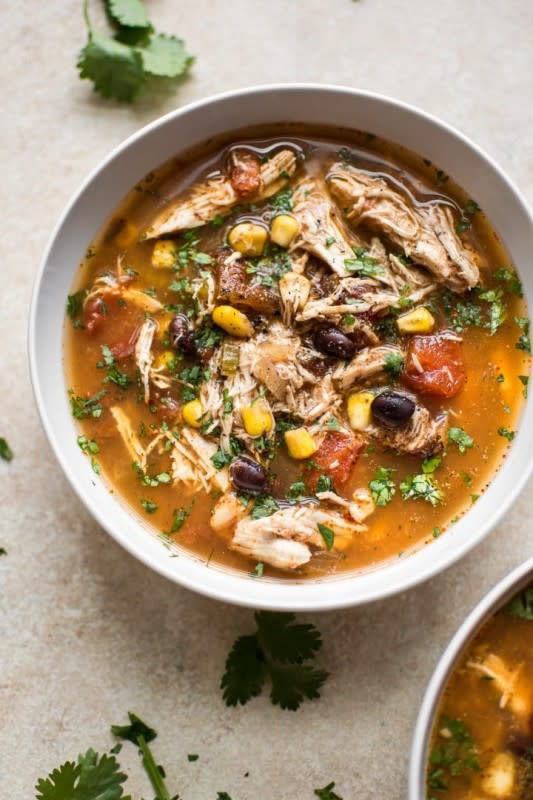 <p>Salt and Lavender</p><p>A slow-cooked, just right bath of shredded chicken, beans, and a soup kissed with chipotle seasoning. </p><p><strong>Get the recipe: <a href="https://www.saltandlavender.com/crockpot-chipotle-chicken-soup/" rel="nofollow noopener" target="_blank" data-ylk="slk:Crock Pot Chipotle Chicken Soup;elm:context_link;itc:0;sec:content-canvas" class="link rapid-noclick-resp">Crock Pot Chipotle Chicken Soup</a></strong></p><p><strong>Related: <a href="https://parade.com/1110192/kristamarshall/bring-chipotle-home-with-copycat-crock-pot-barbacoa-beef-and-easy-burrito-bowls/" rel="nofollow noopener" target="_blank" data-ylk="slk:Crock Pot Copycat Chipotle Barbacoa Beef;elm:context_link;itc:0;sec:content-canvas" class="link rapid-noclick-resp">Crock Pot Copycat Chipotle Barbacoa Beef</a></strong></p>