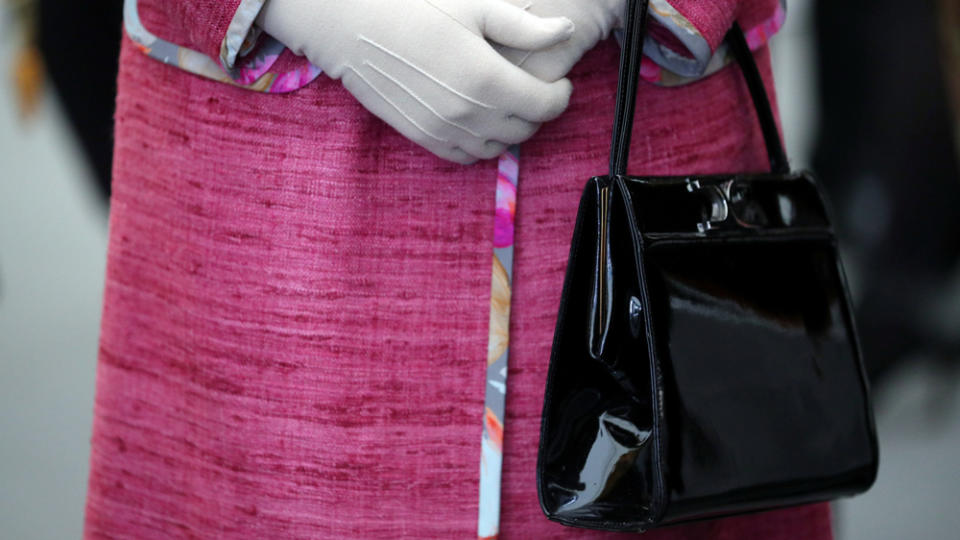 The Queen had a penchant for Launer handbags. - Credit: Hannah McKay - WPA Pool/Getty Images