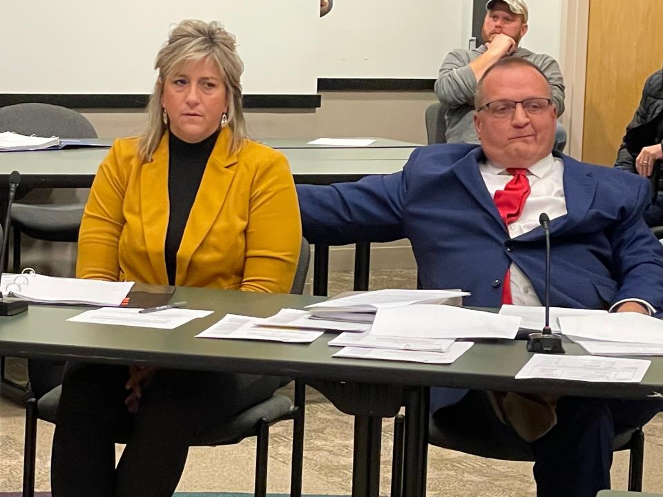 Pekin Mayor Pro Tem Becky (left) and counsel Thomas DeVore listen to deliberations during Friday's hearing with Municipal Officer’s Election Board for the City of Pekin.