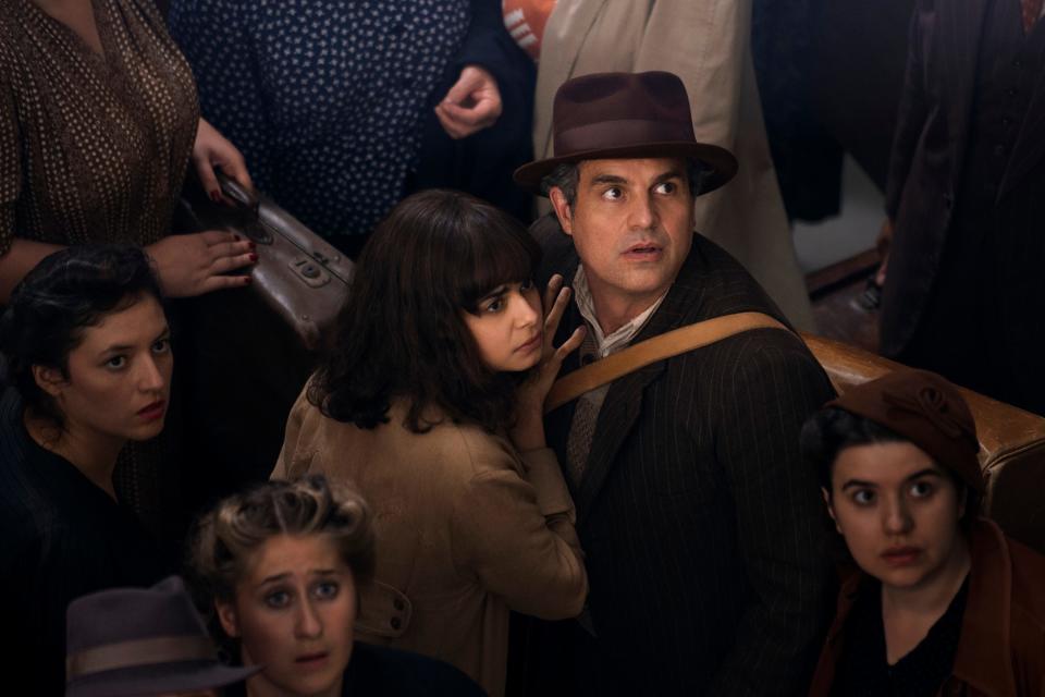 Daniel LeBlanc (Mark Ruffalo) and his blind daughter Marie-Laure (Aria Mia Loberti) flee Nazi-occupied Paris with a legendary diamond in Netflix's World War II drama "All the Light We Cannot See."