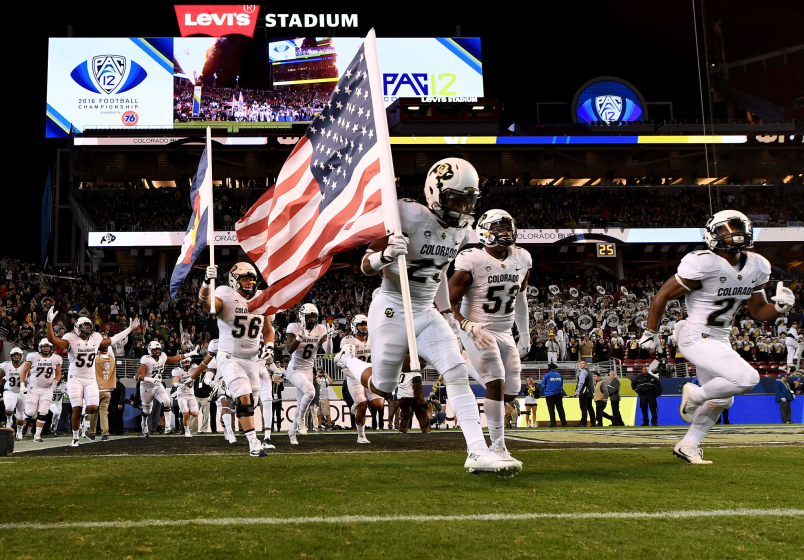 The Colorado Buffaloes run on to the field for their game against the Washington Huskies.