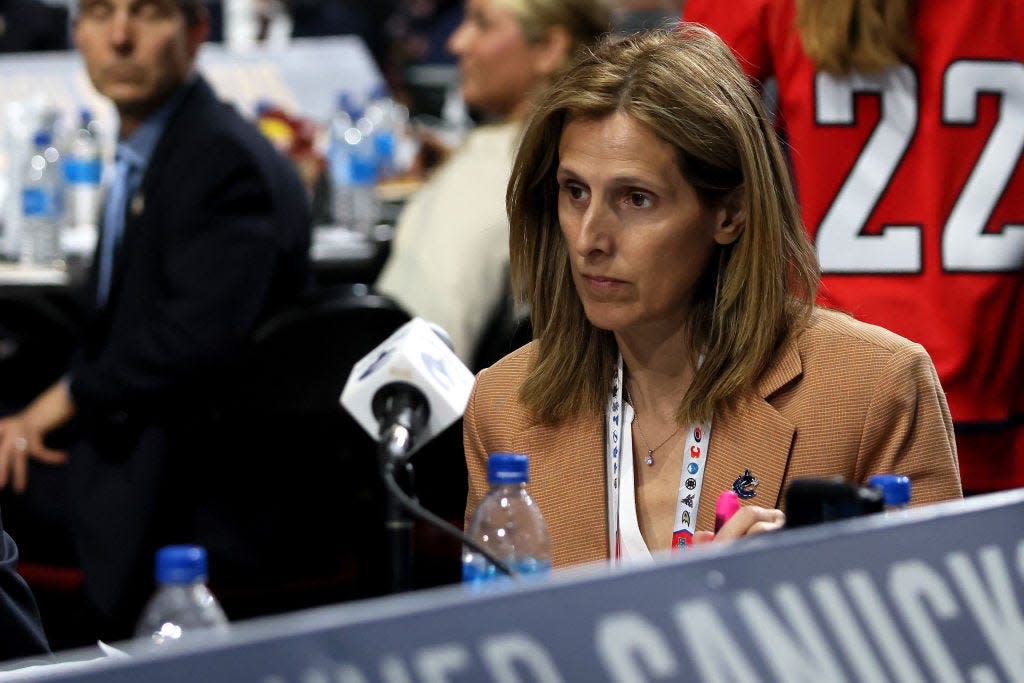 MONTREAL, QUEBEC - JULY 08: Assistant general manager Cammi Granato of the Vancouver Canucks looks on during Round Six of the 2022 Upper Deck NHL Draft at Bell Centre on July 08, 2022 in Montreal, Quebec, Canada. (Photo by Bruce Bennett/Getty Images)