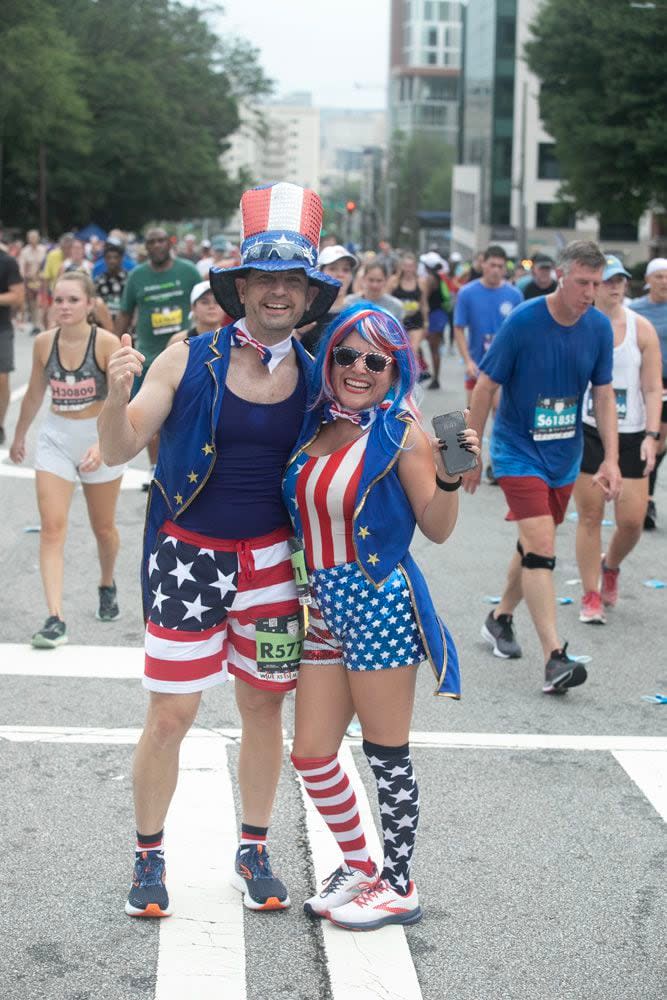 and enjoy these photos from the 2023 Peachtree Road Race!