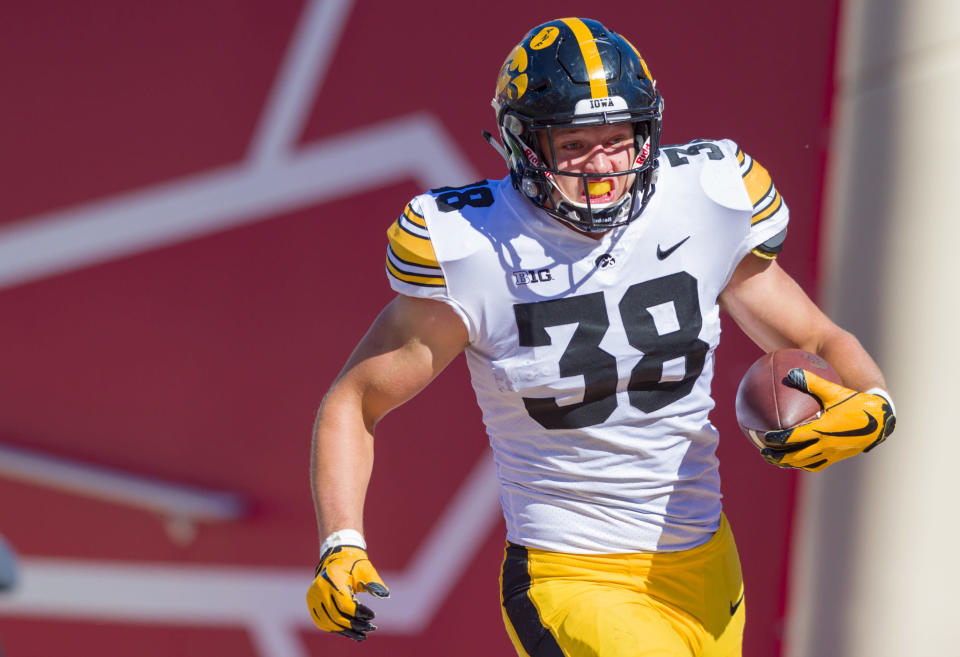 Iowa tight end T.J. Hockenson (38) rushes the ball into the end zone to score during the second half of an NCAA college football game against Indiana Saturday, Oct. 13, 2018, in Bloomington, Ind. Iowa won 42-16. (AP Photo/Doug McSchooler)