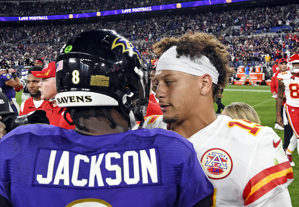 Chiefs quarterback Patrick Mahomes congratulates Ravens quarterback Lamar Jackson after the Ravens' 36-35 victory Sunday night. (Mark Goldman/Icon Sportswire via Getty Images)