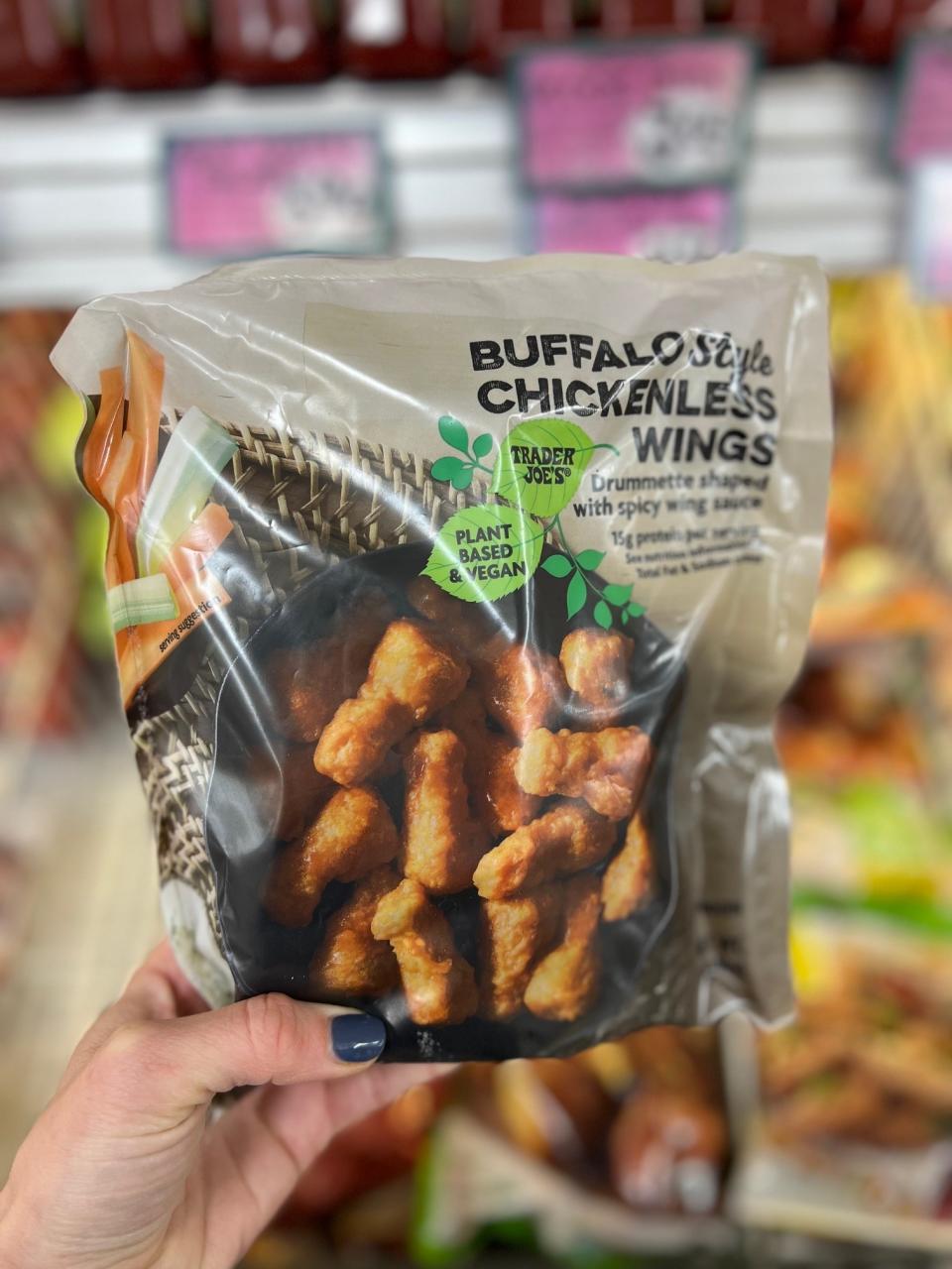 A package of Buffalo Style Chickenless Wings: "drummette shaped with spicy wing sauce"