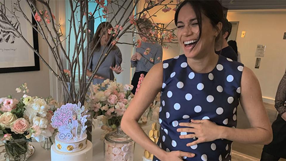 Pregnant Meghan Markle smiling at New York baby shower