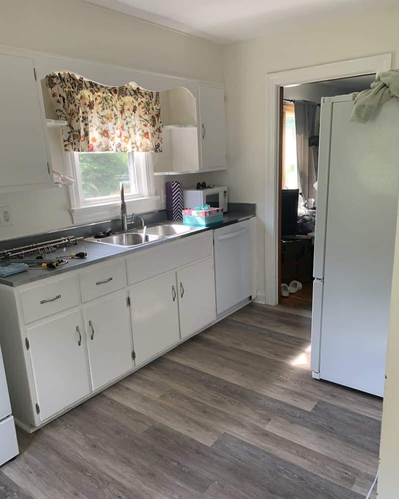 White outdated kitchen before renovation