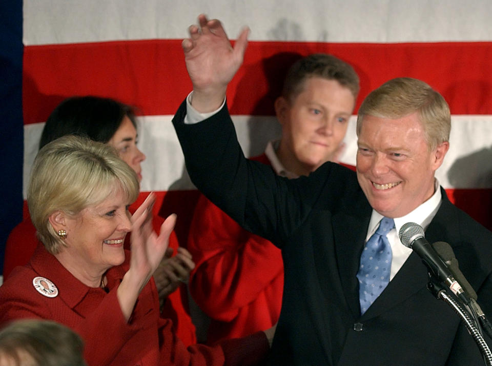 FILE - Rep. Dick Gephardt, D-Mo., and his wife Jane wave to supporters after placing fourth in the Iowa caucuses on Jan. 19, 2003, in Des Moines, Iowa. (AP Photo/Charlie Riedel, File)
