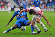 POZNAN, POLAND - JUNE 14: Mario Balotelli of Italy and Ognjen Vukojevic of Croatia battle for the ball during the UEFA EURO 2012 group C match between Italy and Croatia at The Municipal Stadium on June 14, 2012 in Poznan, Poland. (Photo by Jamie McDonald/Getty Images)